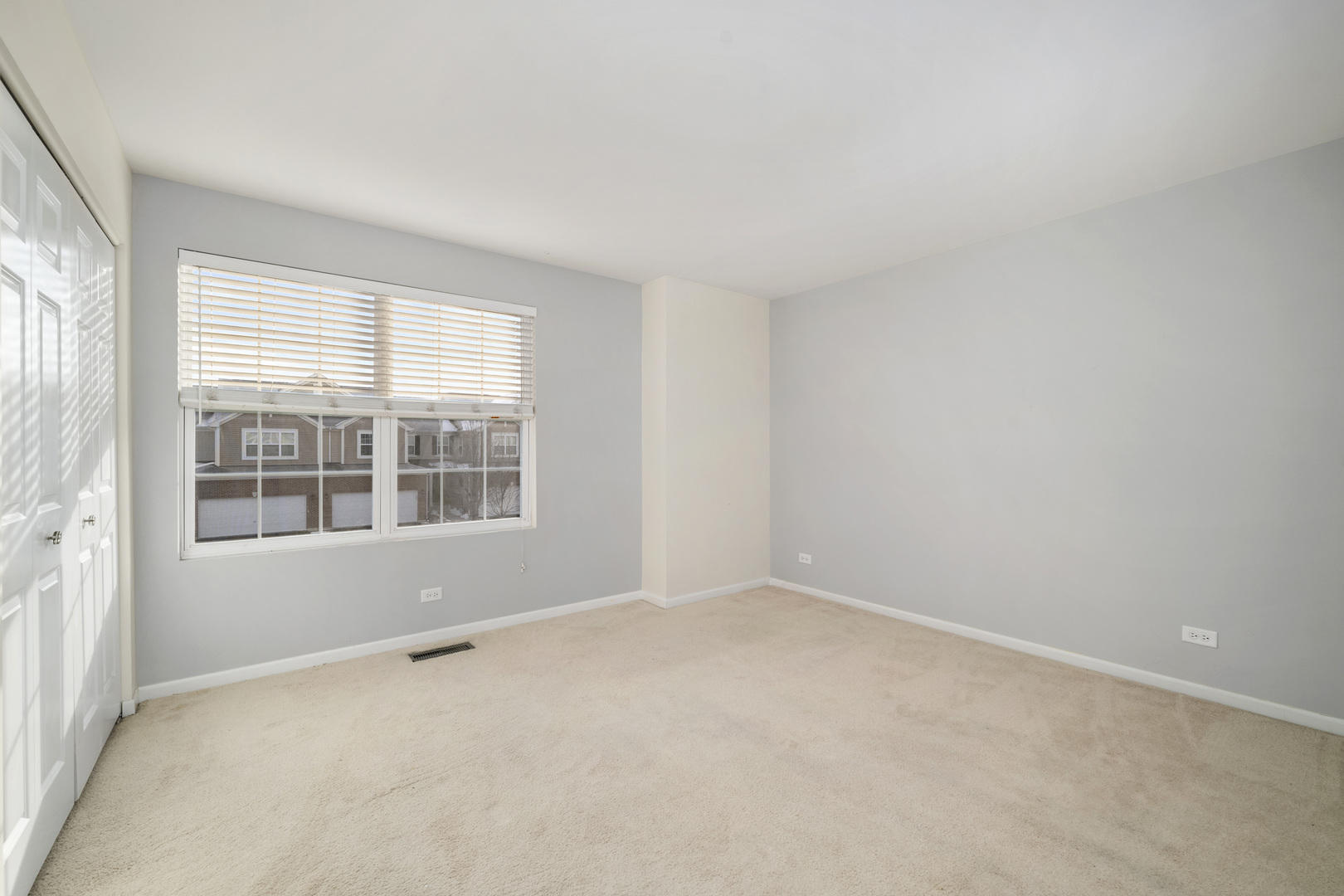 2900 Church Road Aurora, IL 60502 - Photo 10 of 15 an empty room with a window