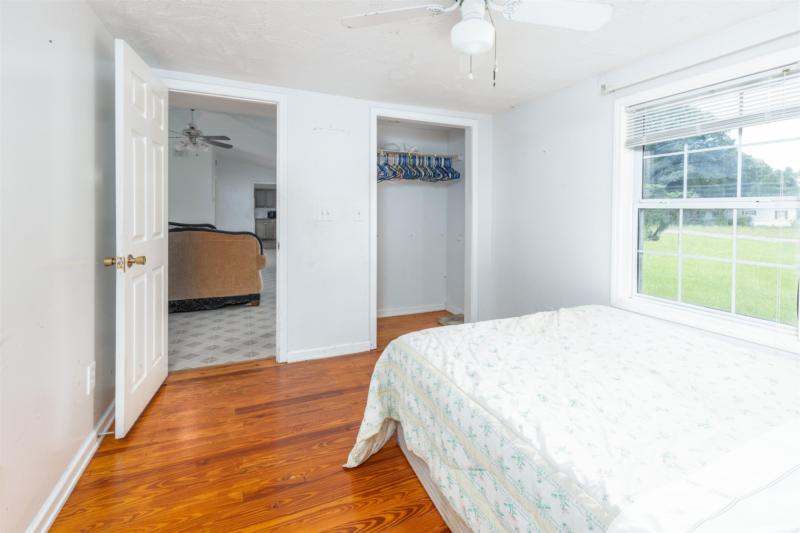 5715 Monroe Smith Road Jacksonville, FL 32210 - Photo 11 of 23 a bedroom with a bed and a window