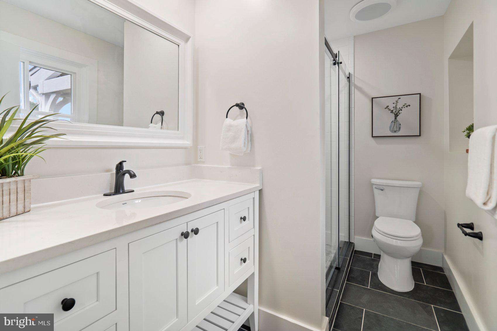 556 Valley View Road Towson, MD 21286 - Photo 20 of 43 a bathroom with a sink toilet and vanity