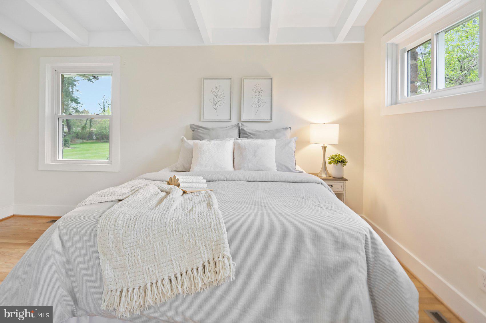 556 Valley View Road Towson, MD 21286 - Photo 23 of 43 a bed room with a bed and a window