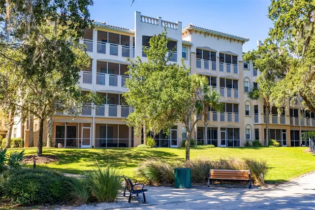 a swimming pool with outdoor seating and yard