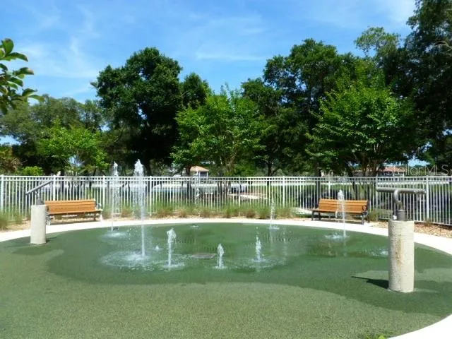 a view of swimming pool with a yard