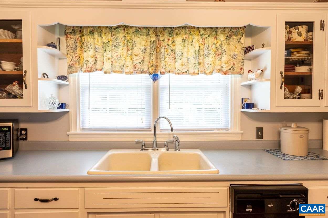 1830 Hunters Lodge Road Palmyra, VA 22963 - Photo 10 of 32 a kitchen with a sink and a window