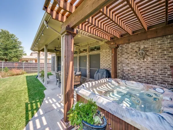 a view of a backyard with a garden and plants
