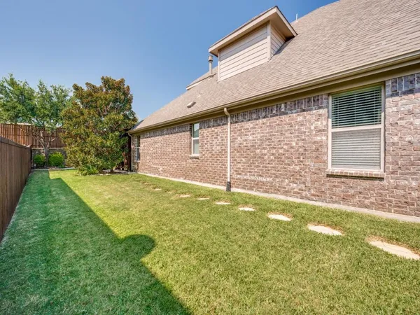 a view of a backyard with a garden