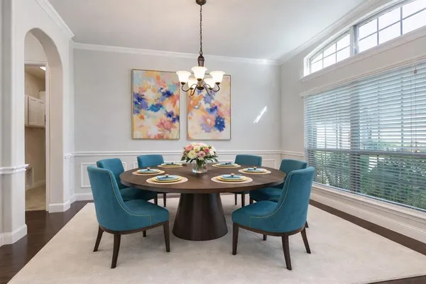 a view of a dining room with furniture window and outside view