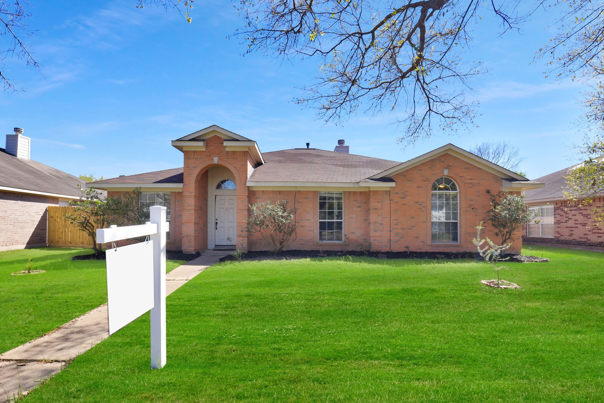 15503 West Little York Road Houston, TX 77084 - Photo 1 of 22 a front view of a house with garden