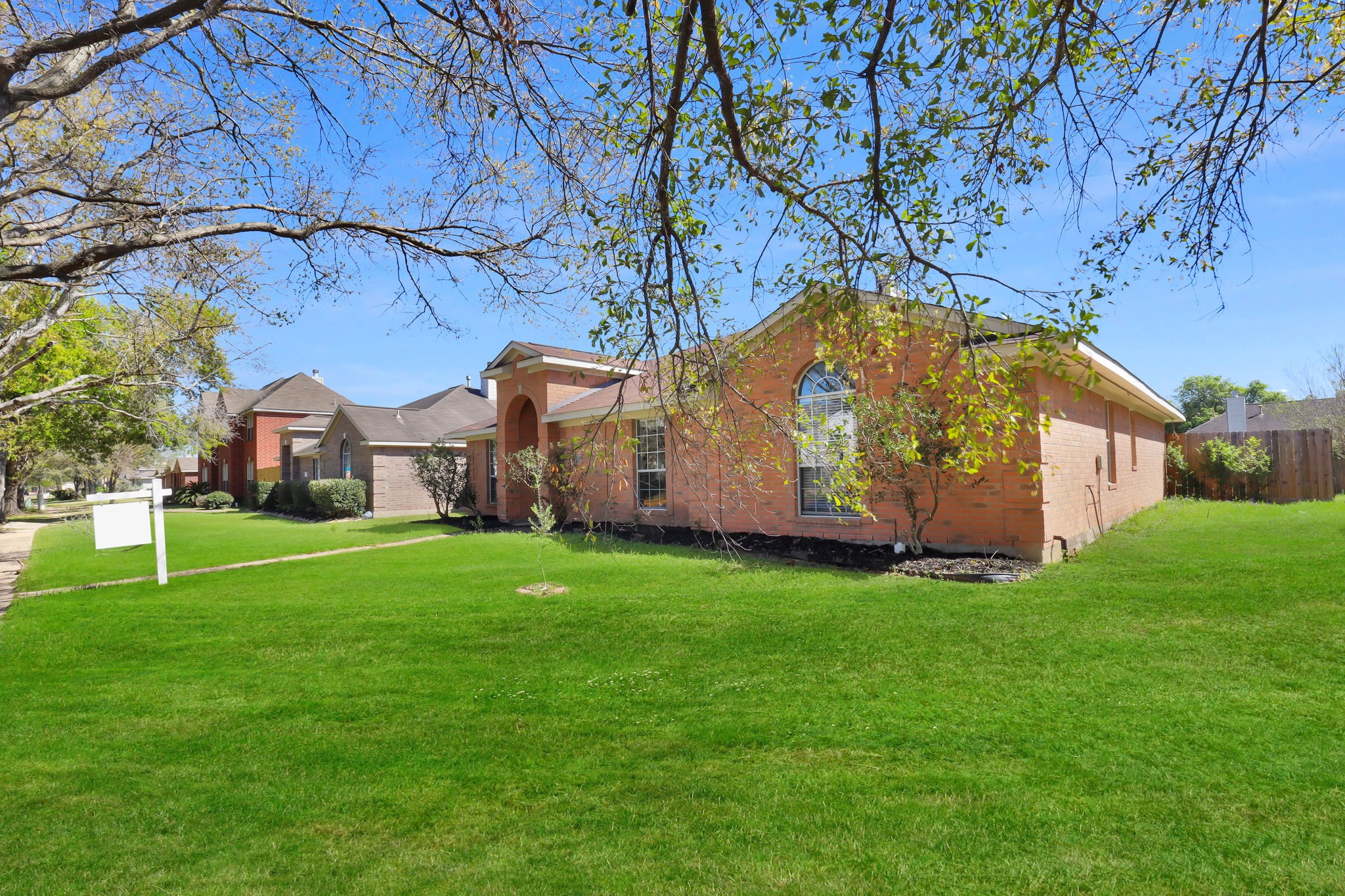15503 West Little York Road Houston, TX 77084 - Photo 2 of 22 a view of a house with a yard
