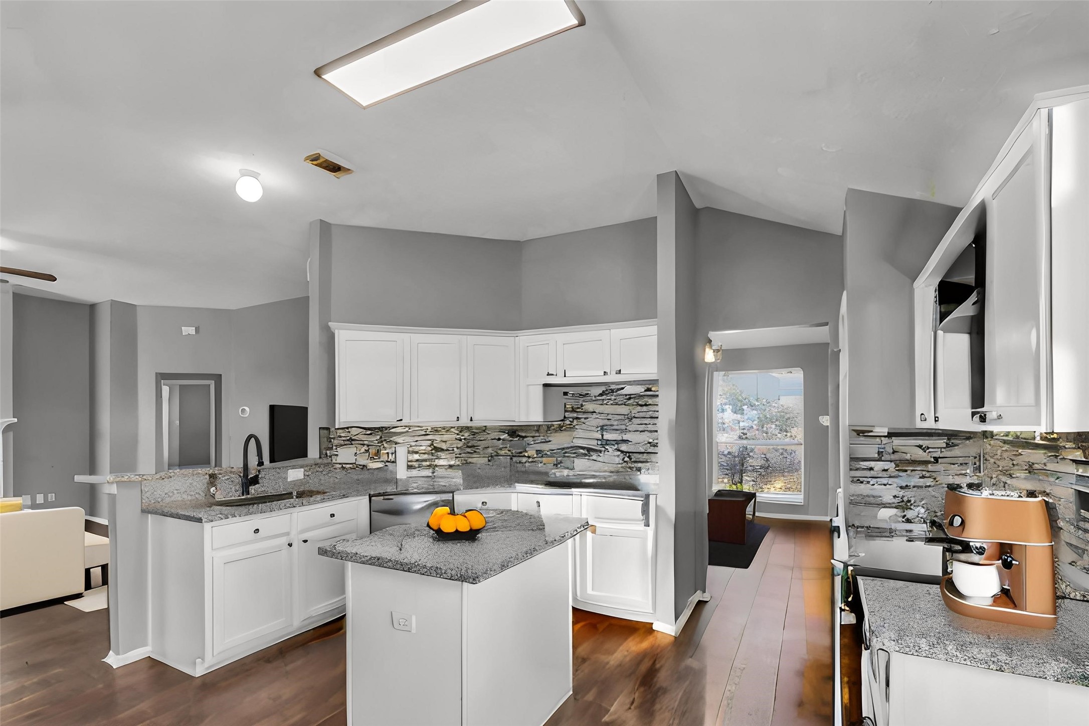 15503 West Little York Road Houston, TX 77084 - Photo 7 of 22 a kitchen that has a lot of cabinets a sink and appliances in it