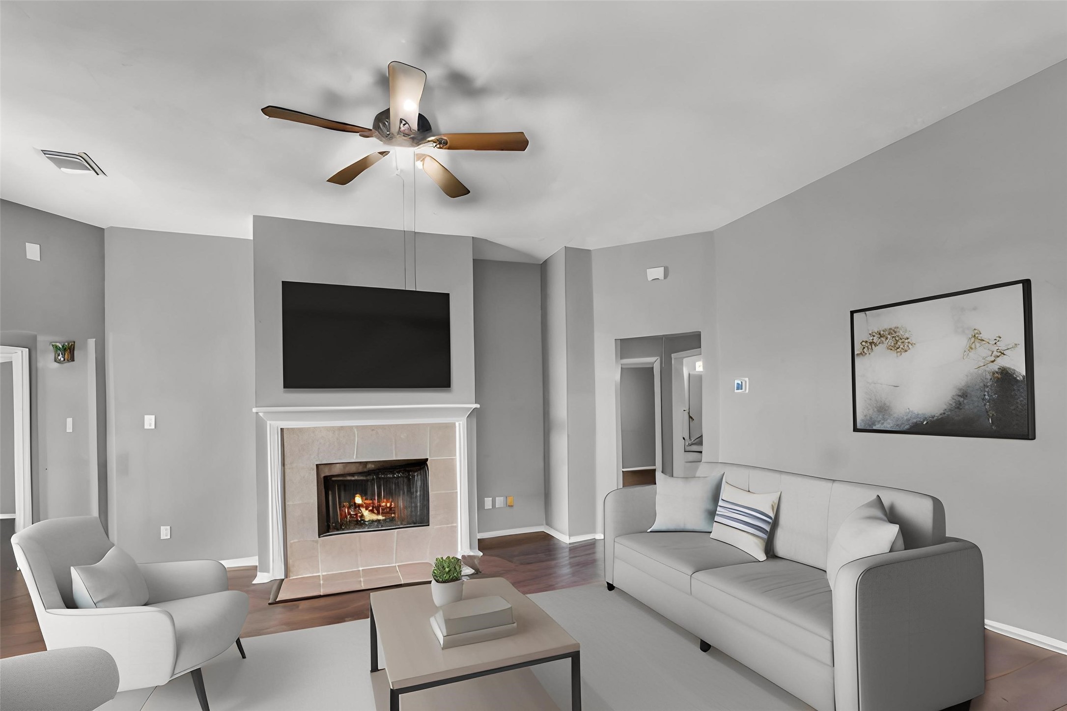 15503 West Little York Road Houston, TX 77084 - Photo 10 of 22 a living room with furniture and a fireplace
