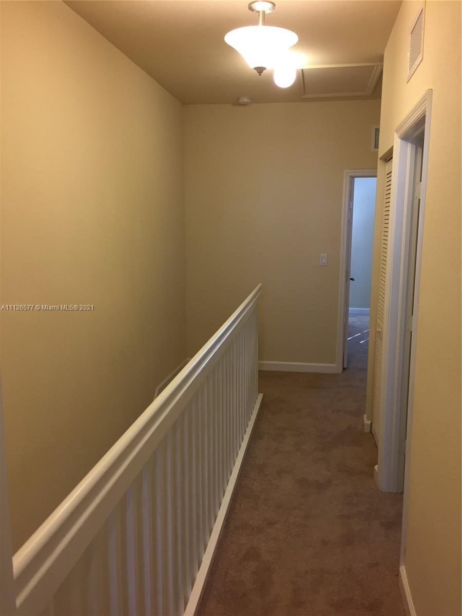 134 Northeast 28th Terrace, Unit 4 Homestead, FL 33033 - Photo 14 of 33 a view of a hallway