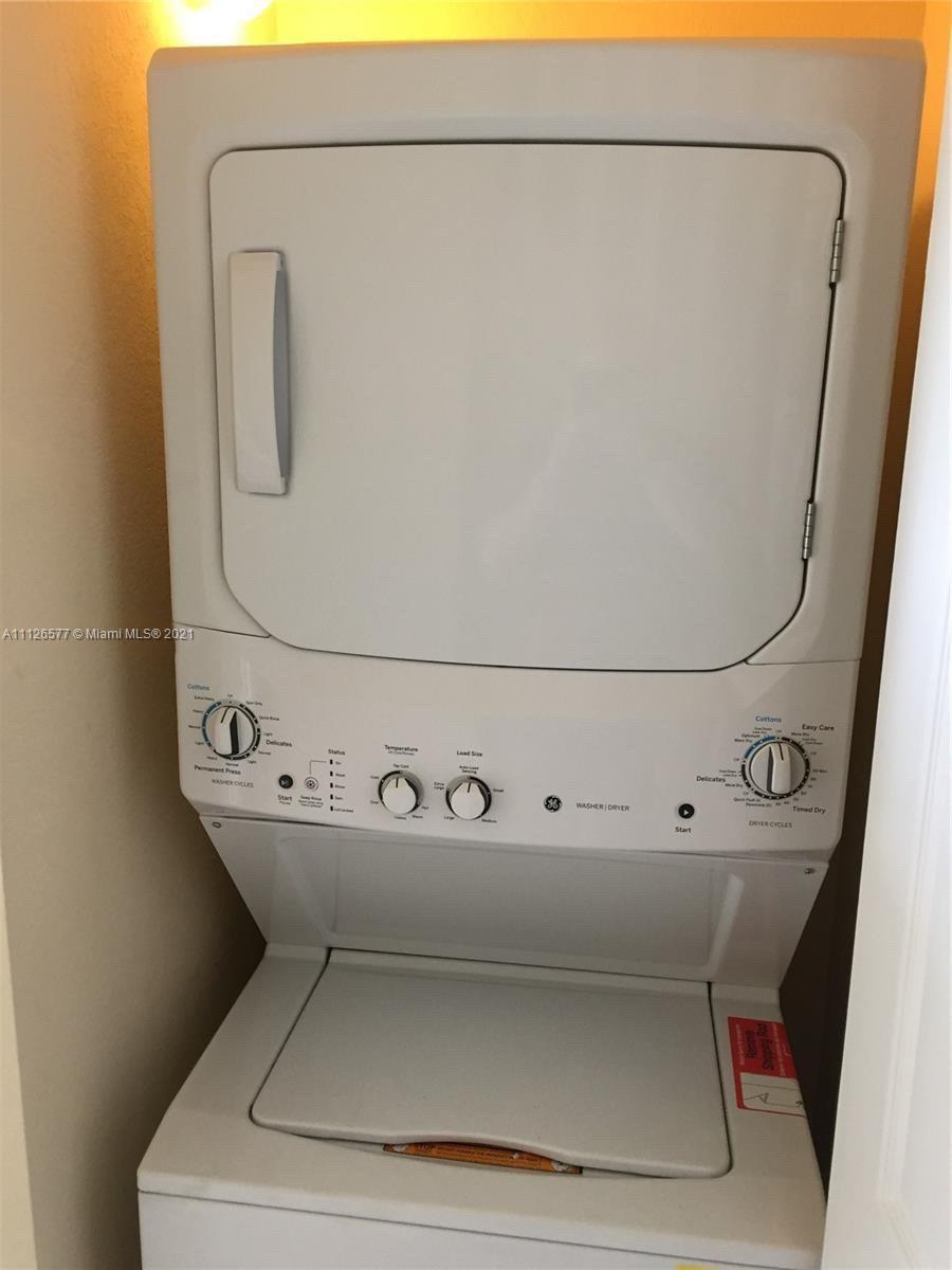 134 Northeast 28th Terrace, Unit 4 Homestead, FL 33033 - Photo 19 of 33 a utility room with dryer and washer