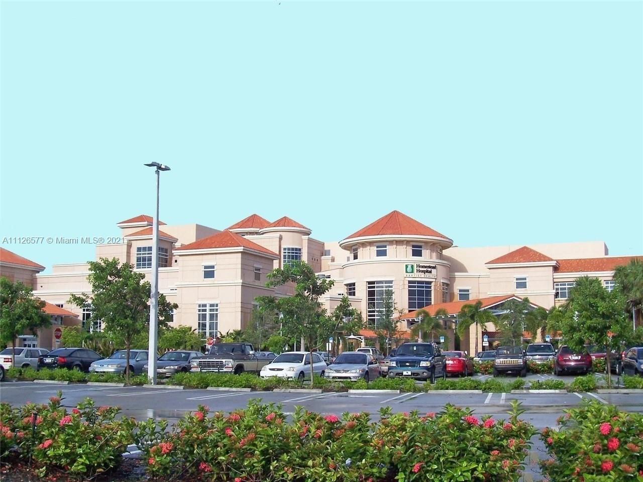 134 Northeast 28th Terrace, Unit 4 Homestead, FL 33033 - Photo 31 of 33 a front view of a building with street view