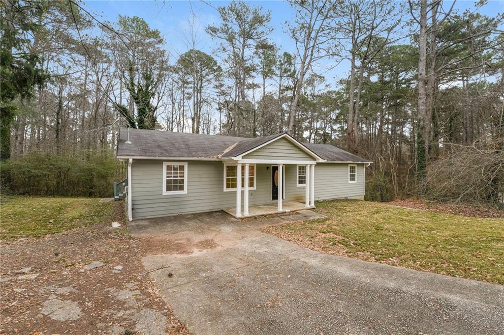 528 Newlin Court Lawrenceville, GA 30046 - Photo 2 of 30 a front view of a house with a yard