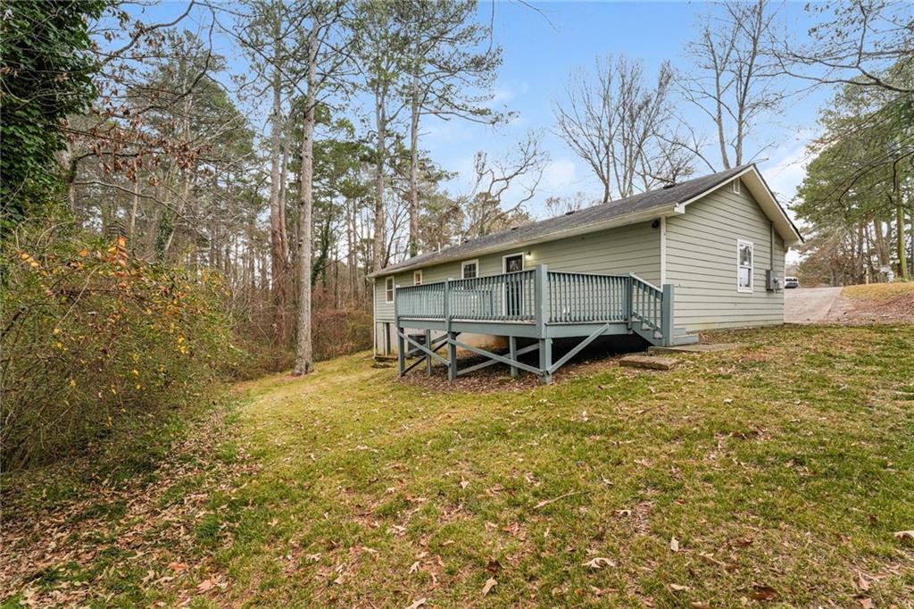 528 Newlin Court Lawrenceville, GA 30046 - Photo 29 of 30 a view of a house with a yard