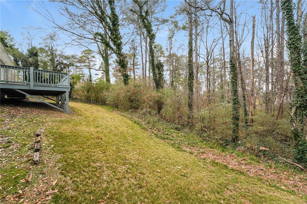 528 Newlin Court Lawrenceville, GA 30046 - Photo 30 of 30 a view of a yard with wooden fence