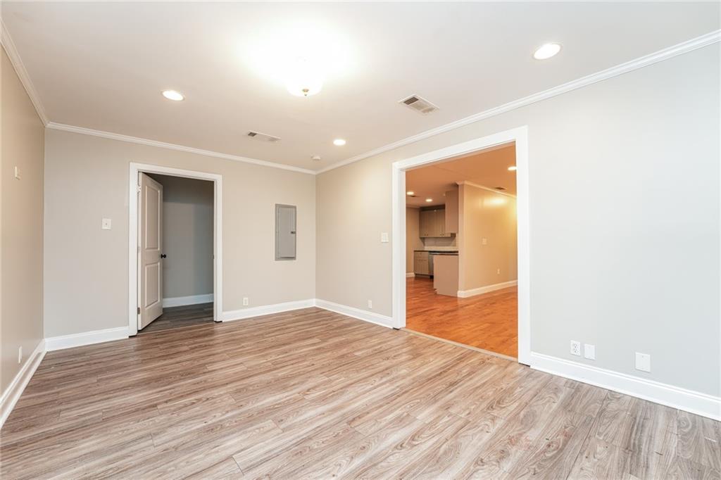 528 Newlin Court Lawrenceville, GA 30046 - Photo 9 of 30 wooden floor in an empty room with wooden floor