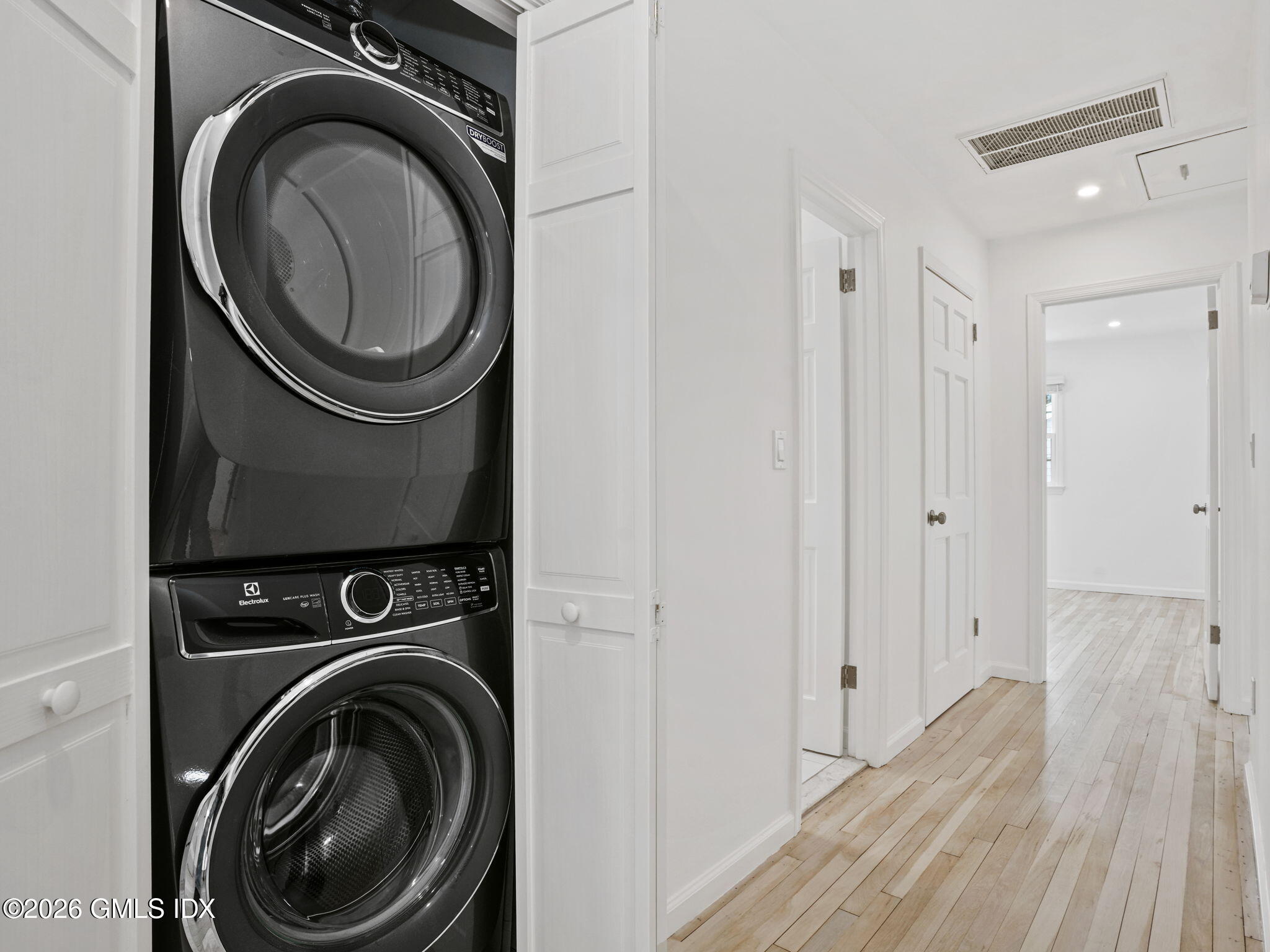 104 Hillcrest Park Road Cos Cob, CT 06807 - Photo 15 of 25 a view of a hallway with washer and dryer