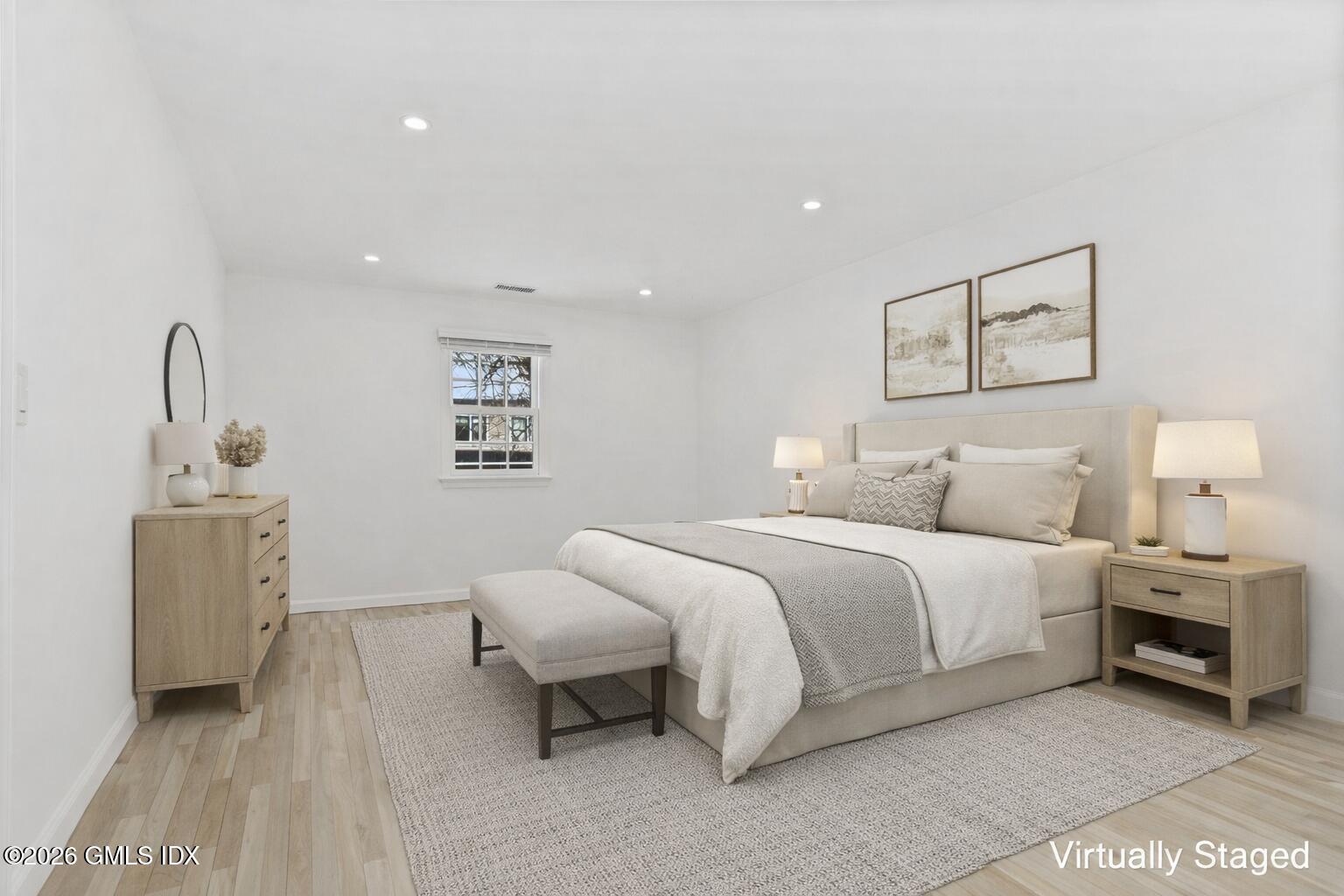 104 Hillcrest Park Road Cos Cob, CT 06807 - Photo 17 of 25 a spacious bedroom with a bed and a dresser