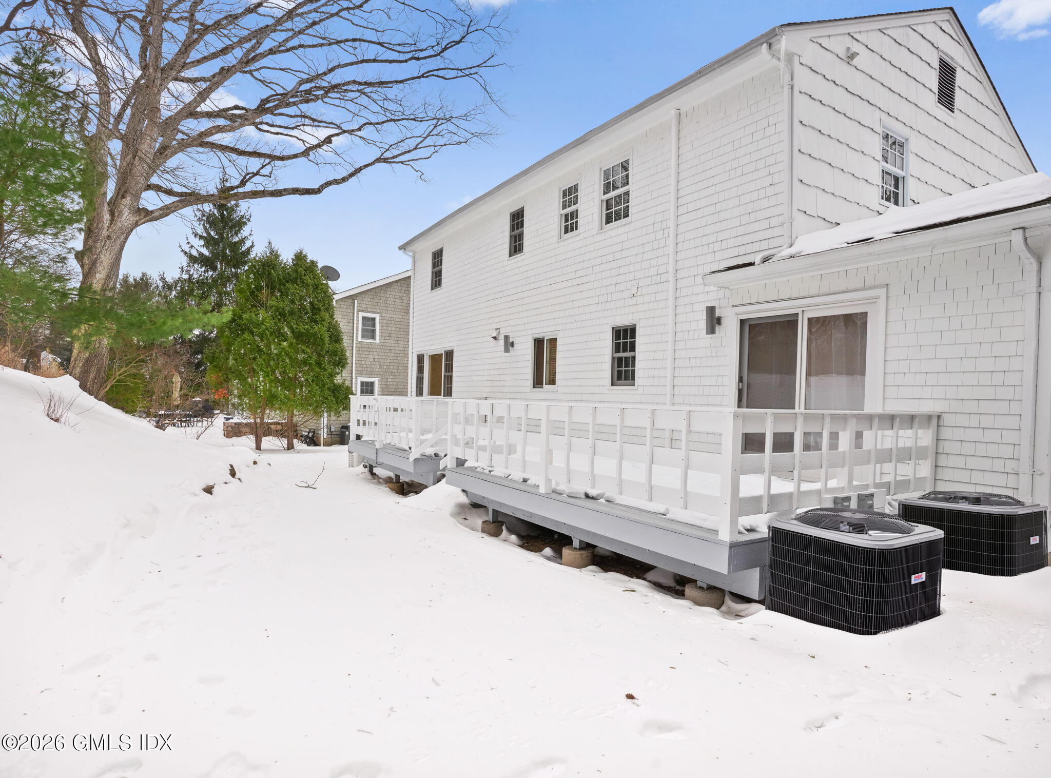 104 Hillcrest Park Road Cos Cob, CT 06807 - Photo 25 of 25 a view of a house with yard and sitting area