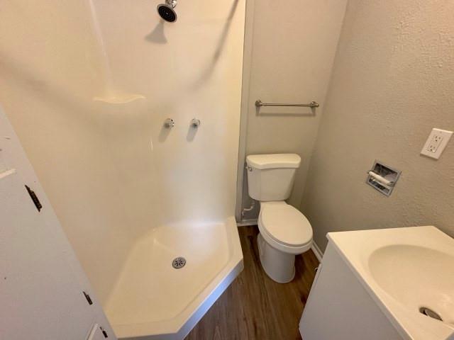 1045 HCR 2124 Loop Whitney, TX 76692 - Photo 13 of 26 a bathroom with a toilet and a sink