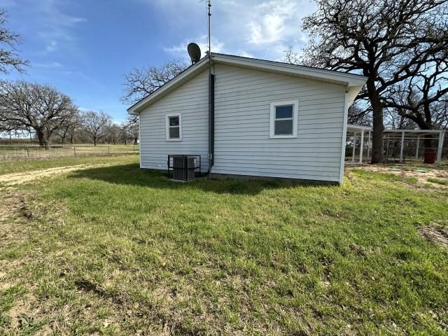 1045 HCR 2124 Loop Whitney, TX 76692 - Photo 21 of 26 a view of a backyard of the house
