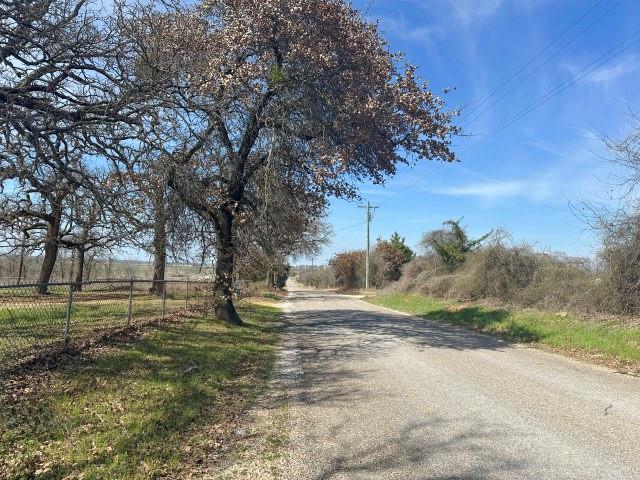 1045 HCR 2124 Loop Whitney, TX 76692 - Photo 6 of 26 a view of yard with tree
