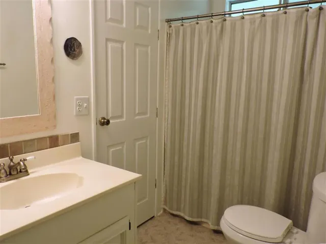 a bathroom with a sink and a bathtub