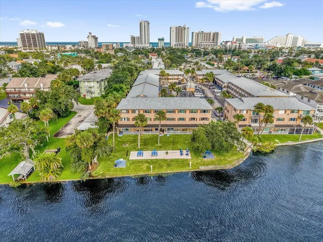 an aerial view of a houses with outdoor space