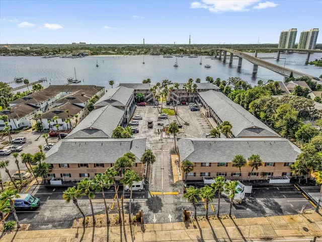 a view of a terrace with a table and chairs