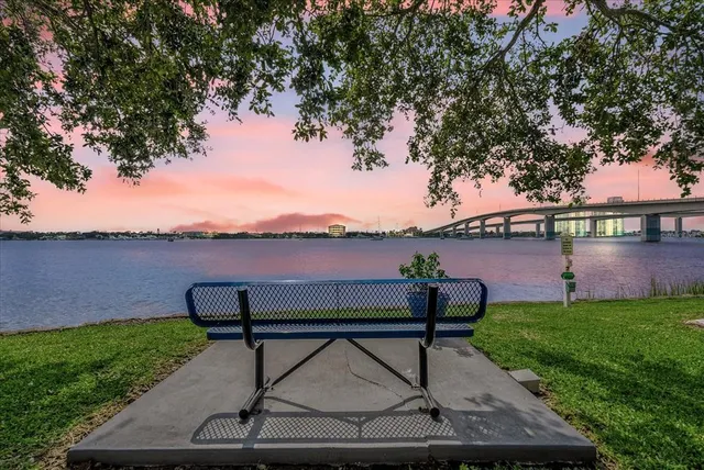 a view of a terrace with chairs and a table