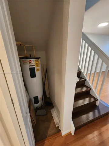 a view of entryway with wooden floor