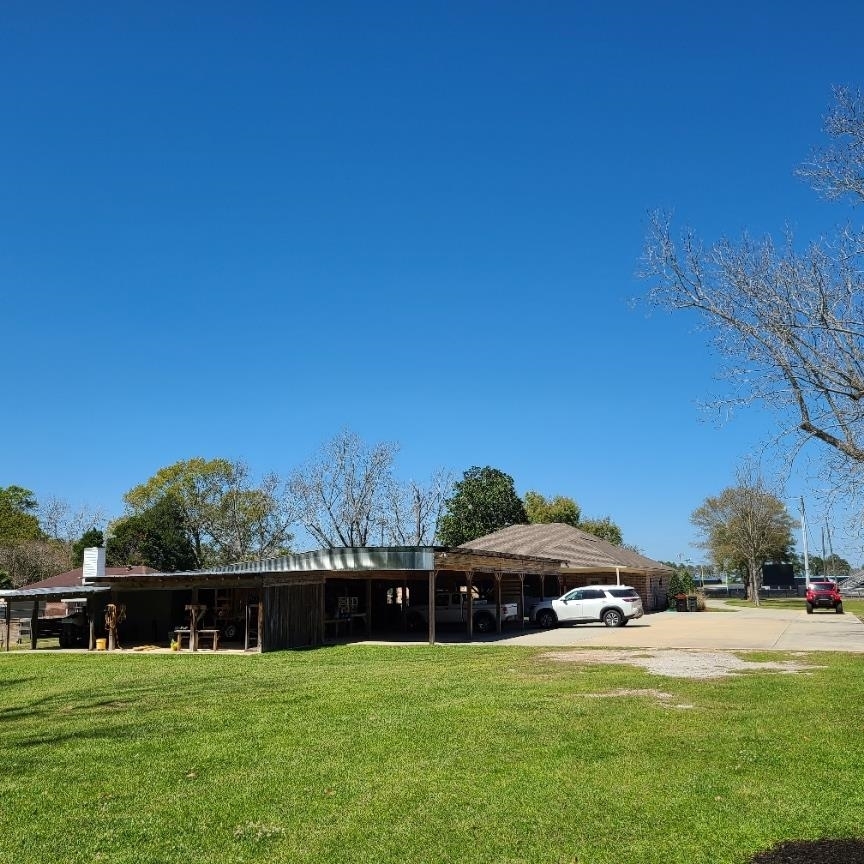 10051 Blackwell Nursery Road Semmes, AL 36575 - Photo 49 of 54 View of front of property featuring a front lawn