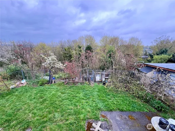 a view of a garden with houses