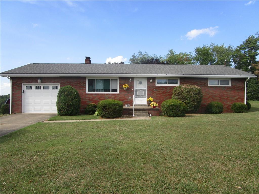 112 State Hill Road Smithton, PA 15479 - Photo 1 of 25 front view of a house with a yard