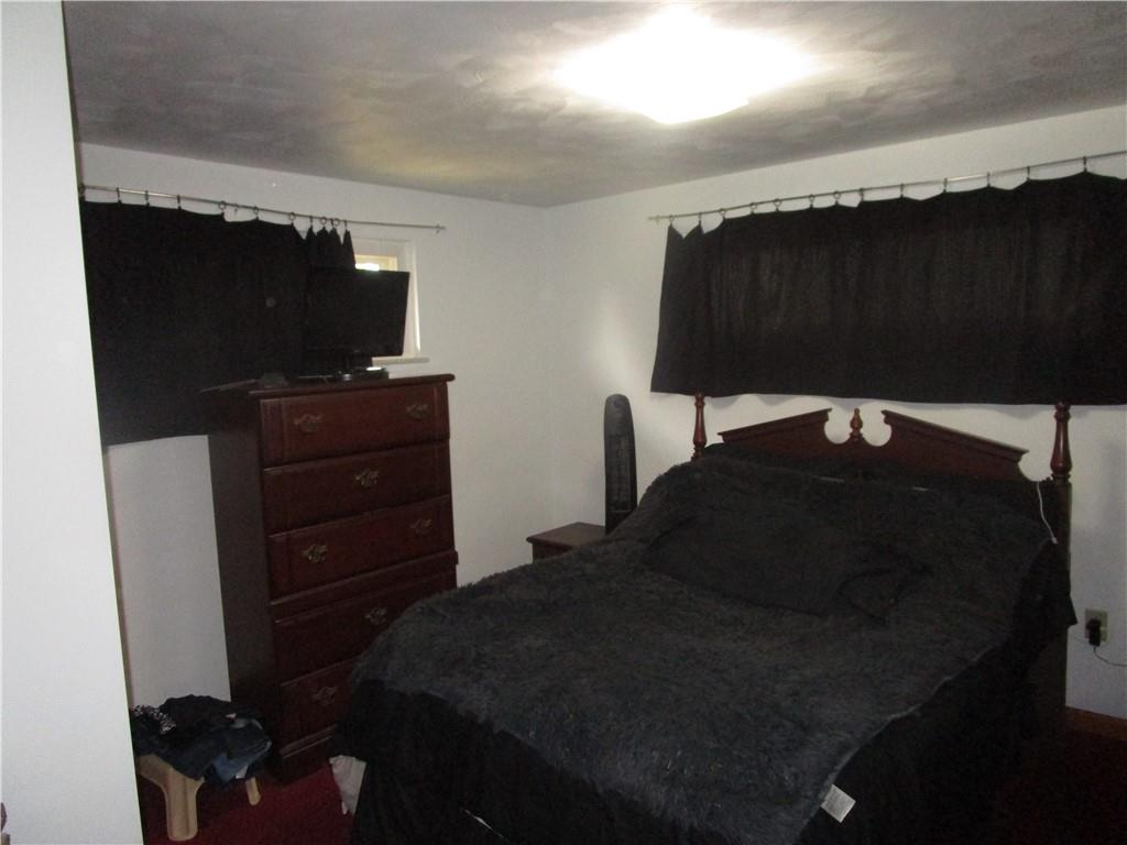 112 State Hill Road Smithton, PA 15479 - Photo 13 of 25 a bedroom with a bed and a television