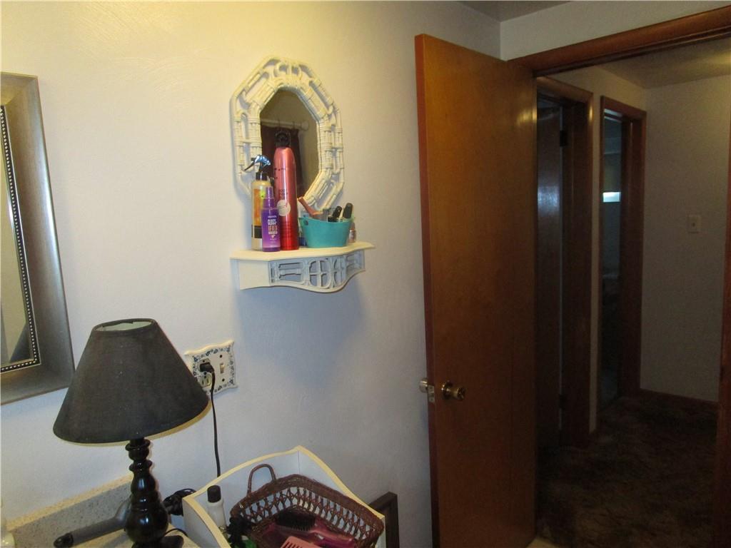 112 State Hill Road Smithton, PA 15479 - Photo 16 of 25 a view of a hallway with washer and dryer