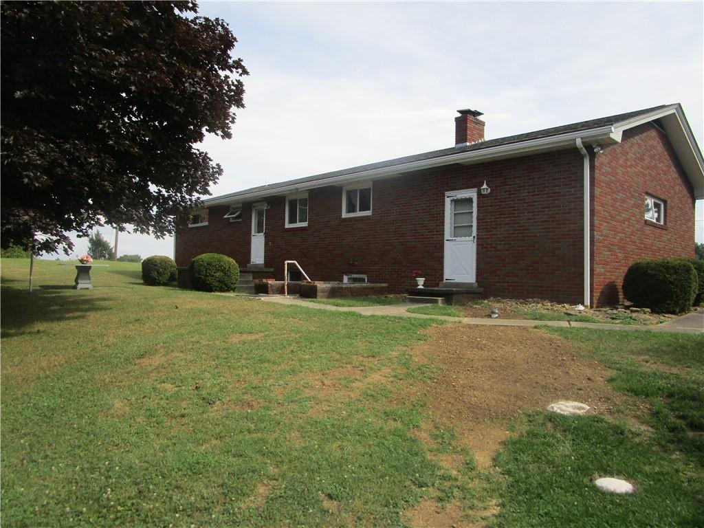 112 State Hill Road Smithton, PA 15479 - Photo 22 of 25 a front view of house with yard