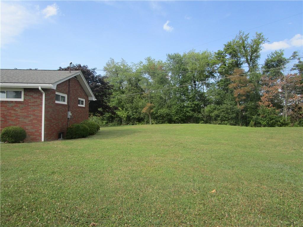 112 State Hill Road Smithton, PA 15479 - Photo 3 of 25 a front view of a house with a yard