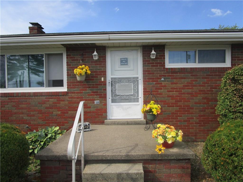 112 State Hill Road Smithton, PA 15479 - Photo 5 of 25 a front view of a house with outdoor seating