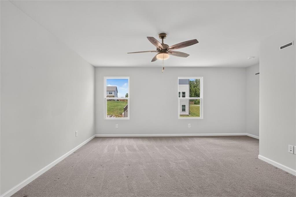 107 Ledgemont Way Acworth, GA 30101 - Photo 43 of 57 a view of room with window and ceiling fan
