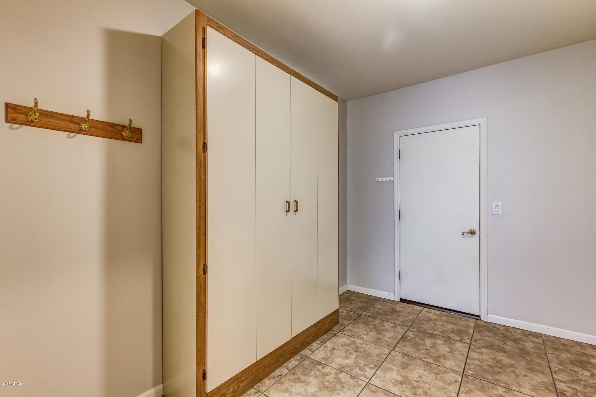 4446 East Camelback Road, Unit 114 Phoenix, AZ 85018 - Photo 36 of 61 Mudroom with Murphy Bed