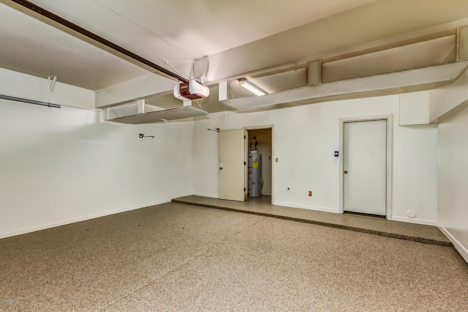 4446 East Camelback Road, Unit 114 Phoenix, AZ 85018 - Photo 37 of 61 Garage with new epoxy