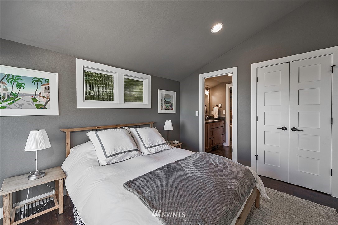 14301 Outer Bay Road Anderson Island, WA 98303 - Photo 14 of 40 a bedroom with a bed and with furniture