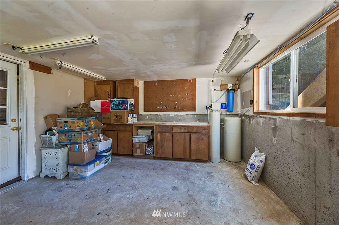 14301 Outer Bay Road Anderson Island, WA 98303 - Photo 22 of 40 a view of storage and utility room