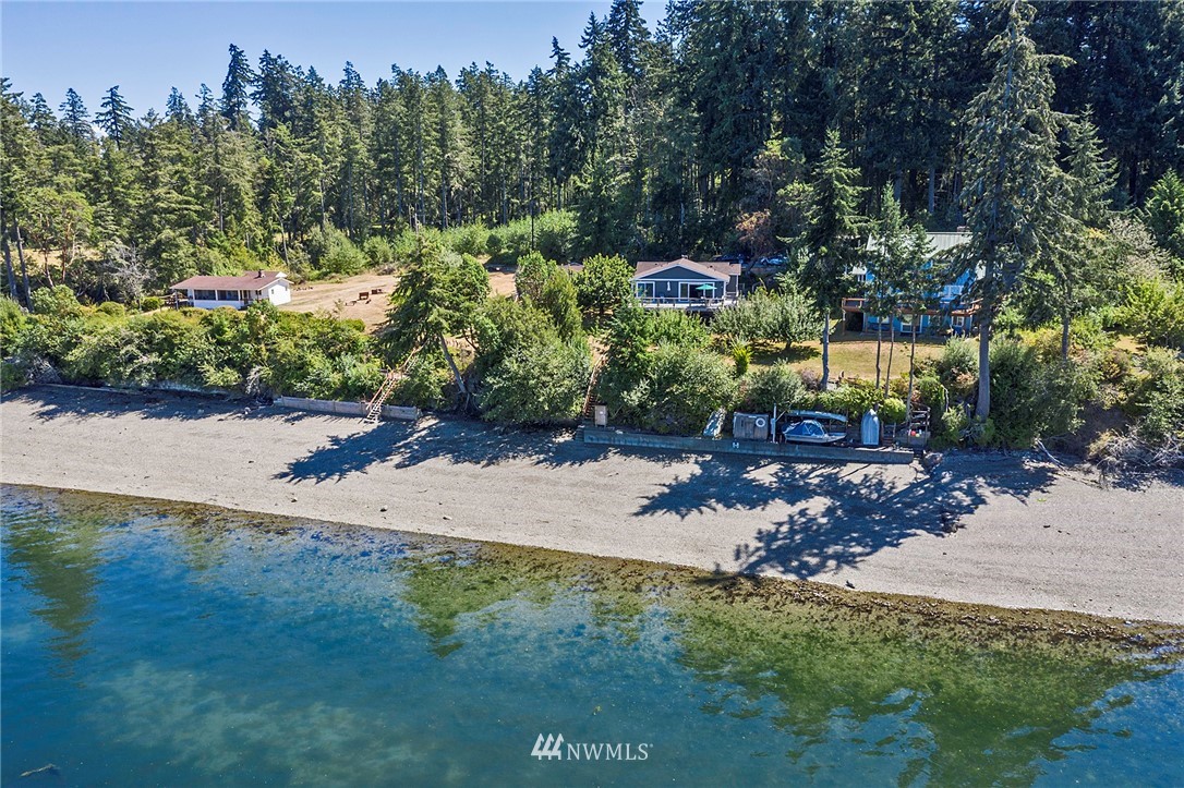 14301 Outer Bay Road Anderson Island, WA 98303 - Photo 30 of 40 a garden covered with lots of trees