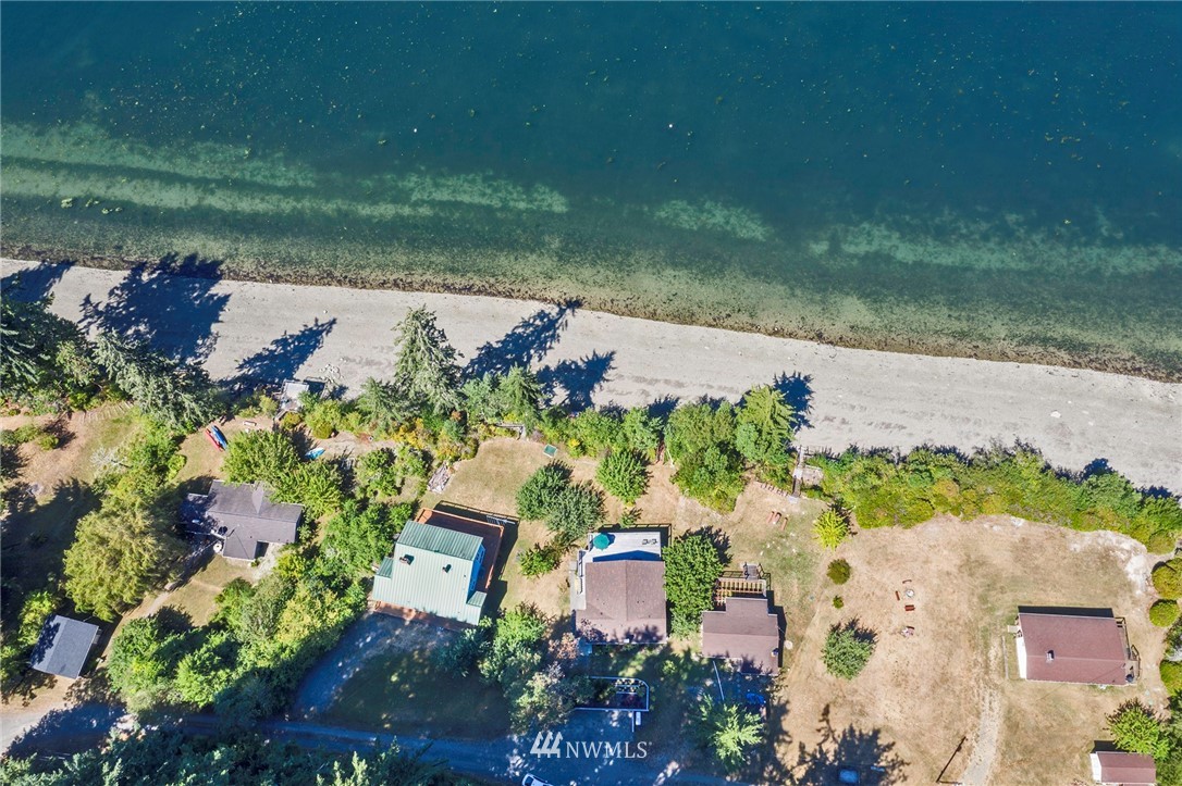 14301 Outer Bay Road Anderson Island, WA 98303 - Photo 36 of 40 an aerial view of a house with a yard