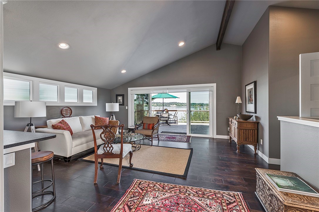 14301 Outer Bay Road Anderson Island, WA 98303 - Photo 7 of 40 a living room with furniture and a wooden floor