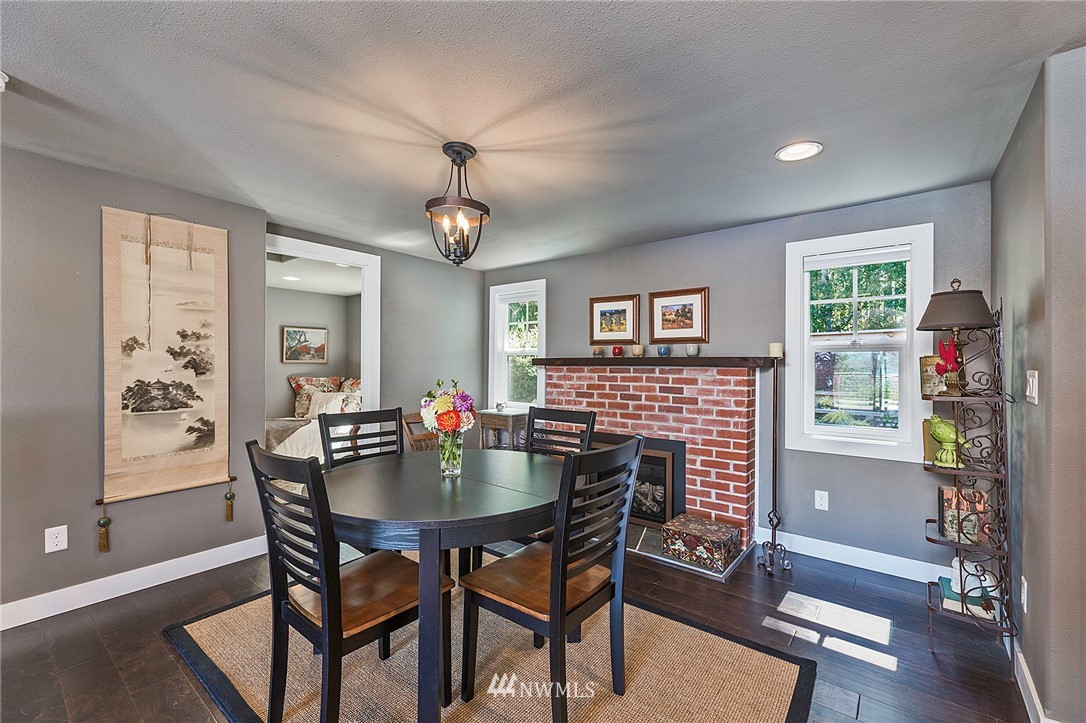 14301 Outer Bay Road Anderson Island, WA 98303 - Photo 10 of 40 a dining room with furniture and window