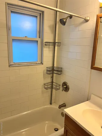 a bathroom with a sink and a shower